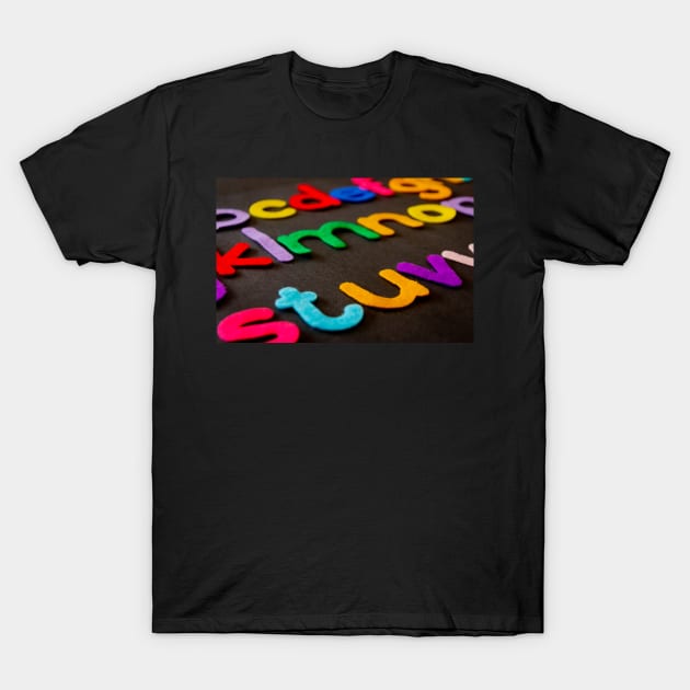 Closeup photo of assorted color alphabets T-Shirt by mydesignontrack